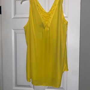 Yellow sleeveless top